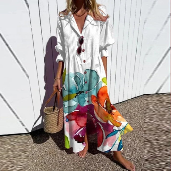 Relaxed fit floral maxi dress with front slit and long sleeve coverage