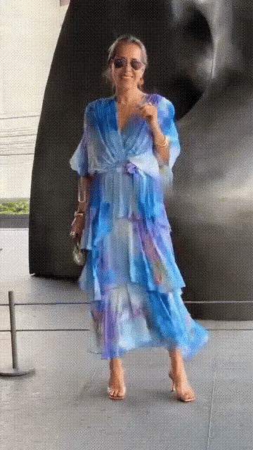 Detail shot of Spring Floral Tiered Chiffon Dress V-neckline and long sleeve with watercolor print