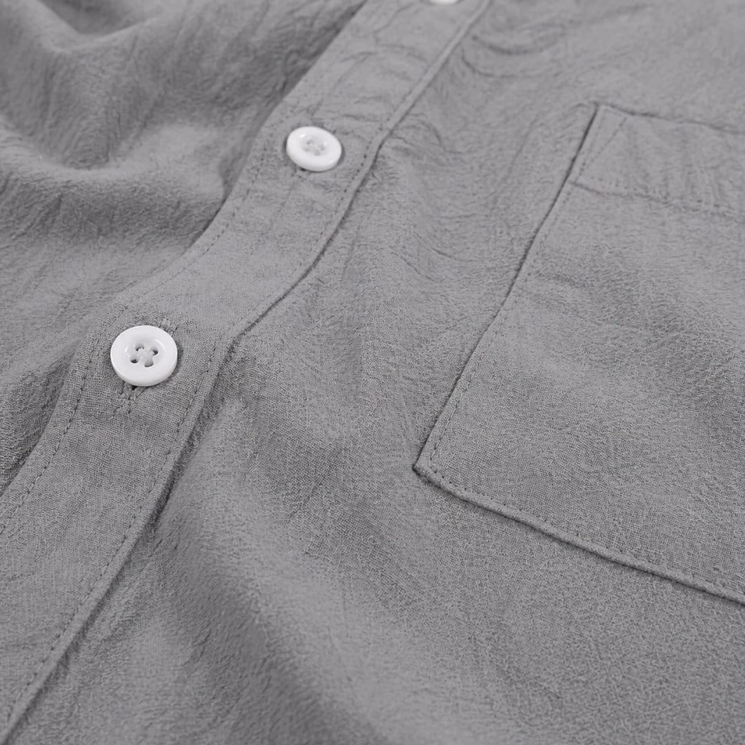 Gray men's summer set with rolled sleeve shirt and above-knee shorts in coordinating fabric