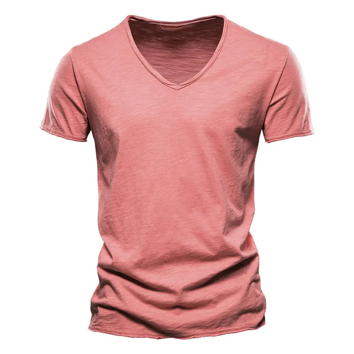 Close-up view of V-neckline detail on men's cotton tshirt with soft fabric texture