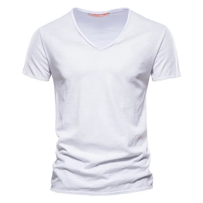 Close-up of V-neckline and shoulder seam construction on men's cotton tshirt