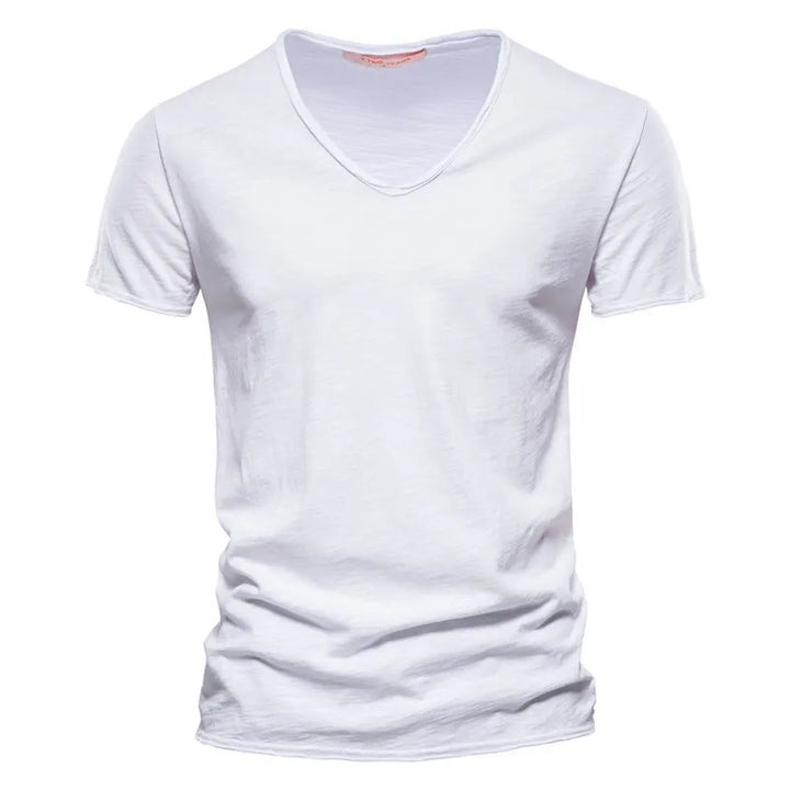 Close-up of V-neckline and shoulder seam construction on men's cotton tshirt
