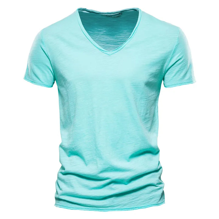 Men's V neck cotton tshirt showing lightweight fabric drape and relaxed silhouette