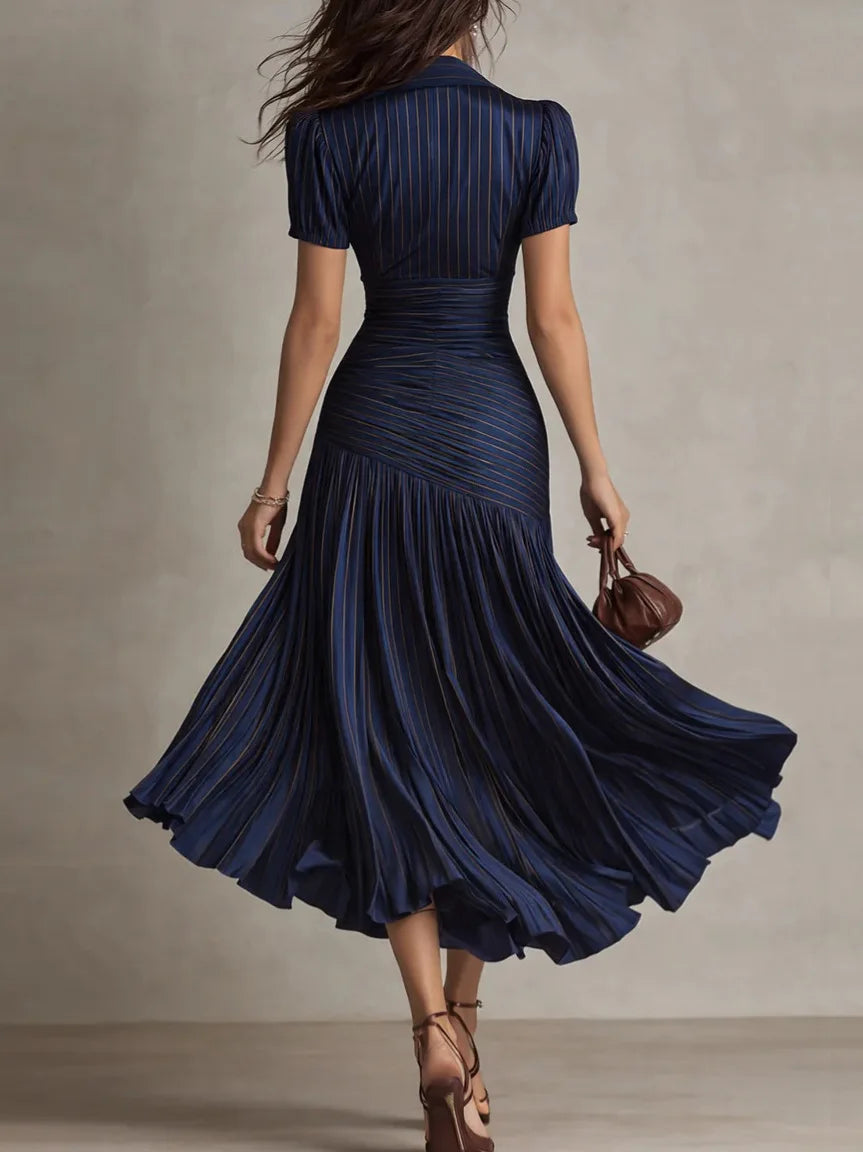 Back view of collared midi dress with puffed short sleeves and pleated skirt