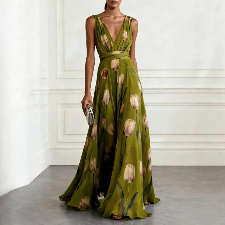 Model wearing light blue floral maxi dress styled for formal wedding occasion