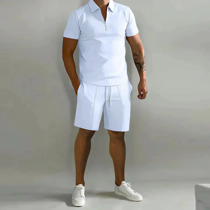 Side angle of men's summer two piece set with polo top and mid-length shorts