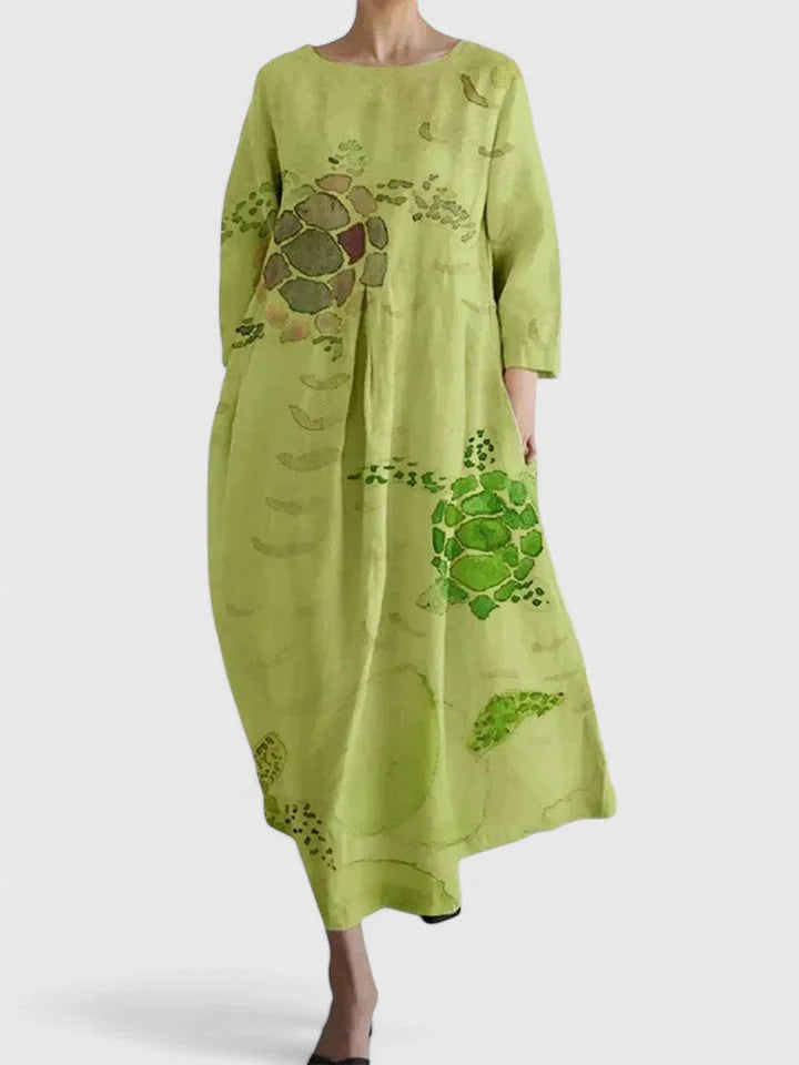 Three-quarter sleeve summer cotton dress in relaxed silhouette with turtle print