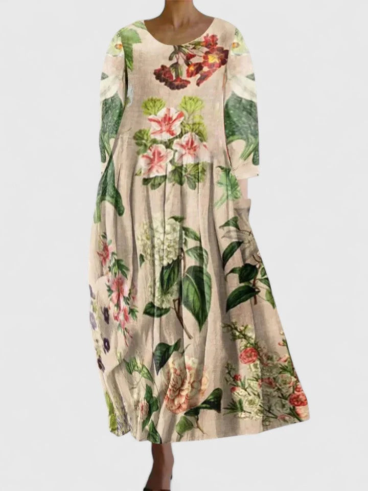 Soft summer cotton dress with playful turtle motif and midi length cut