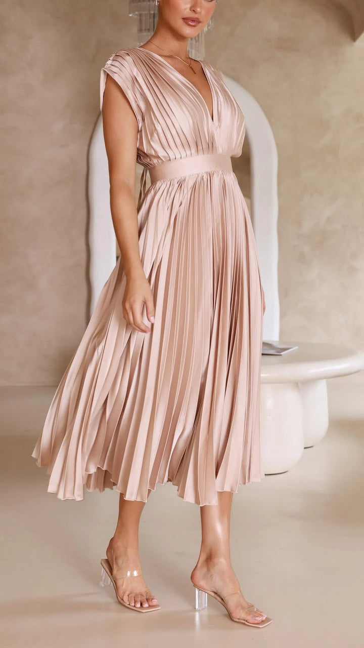 Three-quarter view of Elegant Pleated Maxi Dress V-Neck Flowing showing silhouette
