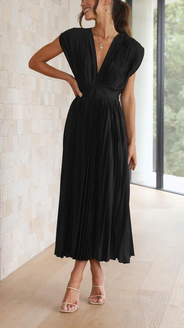 Full pleating detail from waist to hem on Elegant Pleated Maxi Dress V-Neck Flowing