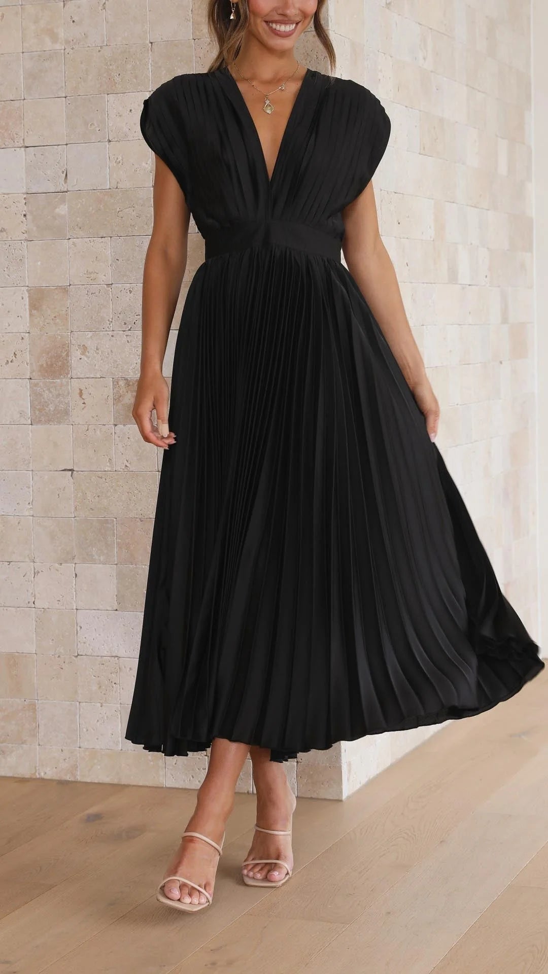 Flowing skirt movement on Elegant Pleated Maxi Dress V-Neck Flowing