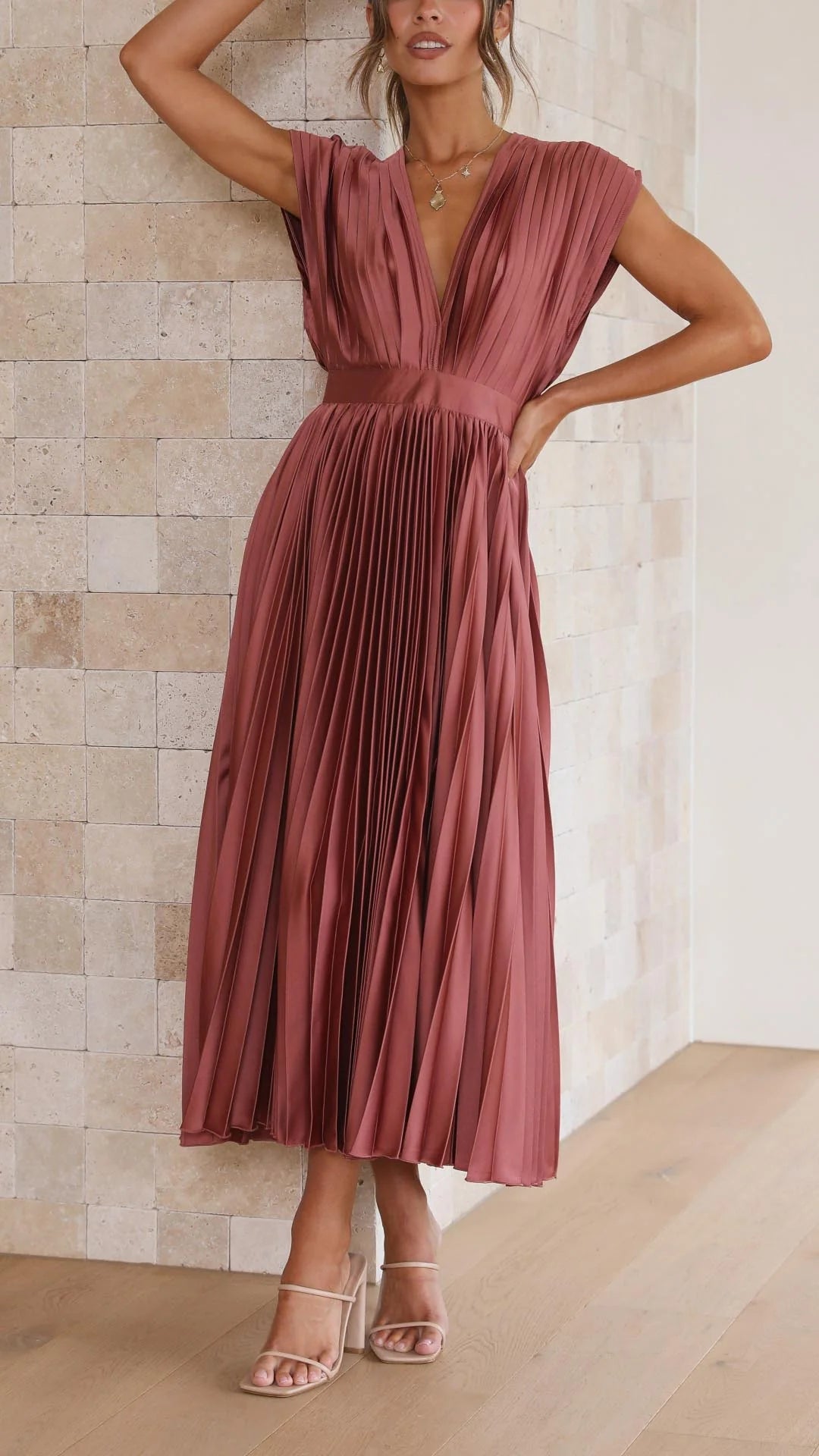 Front view of Elegant Pleated Maxi Dress V-Neck Flowing showing high-waisted silhouette and cap sleeves