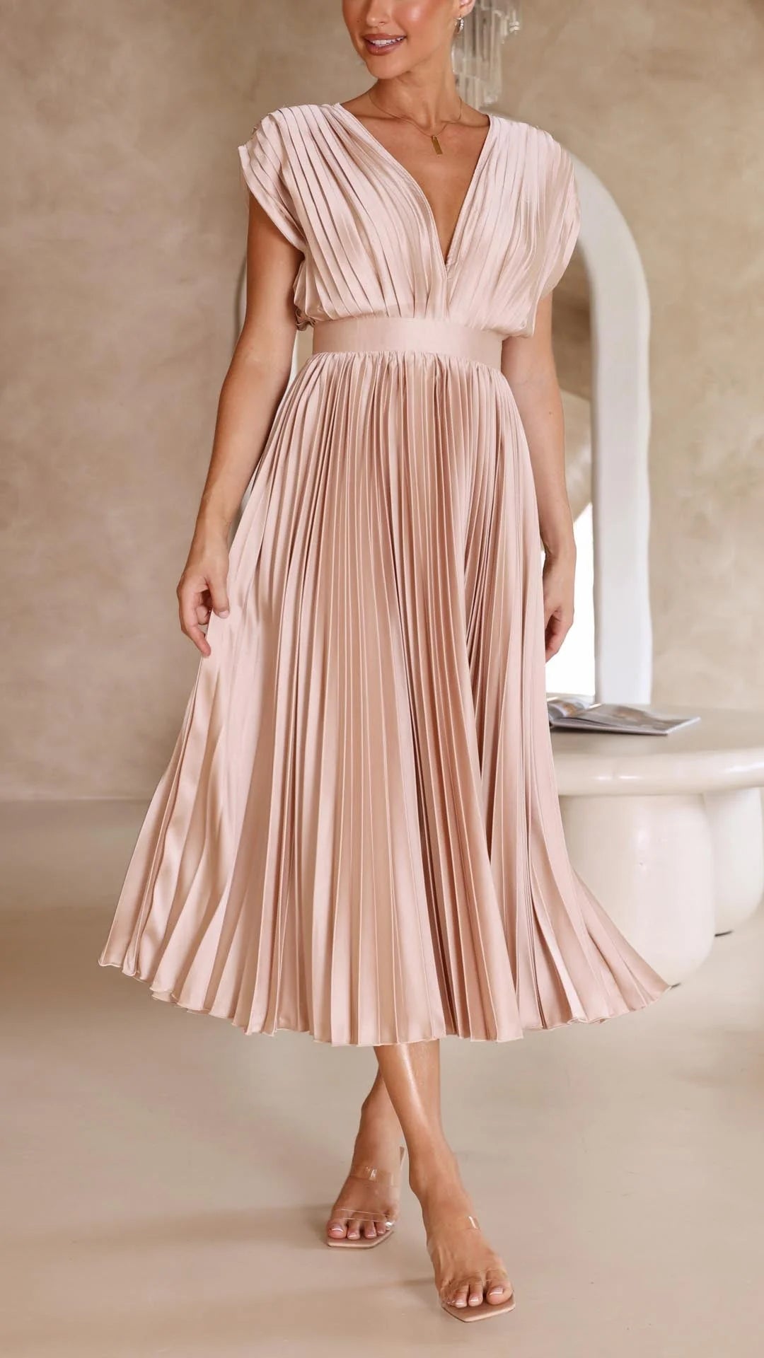 Woman styling Elegant Pleated Maxi Dress V-Neck Flowing for evening occasion