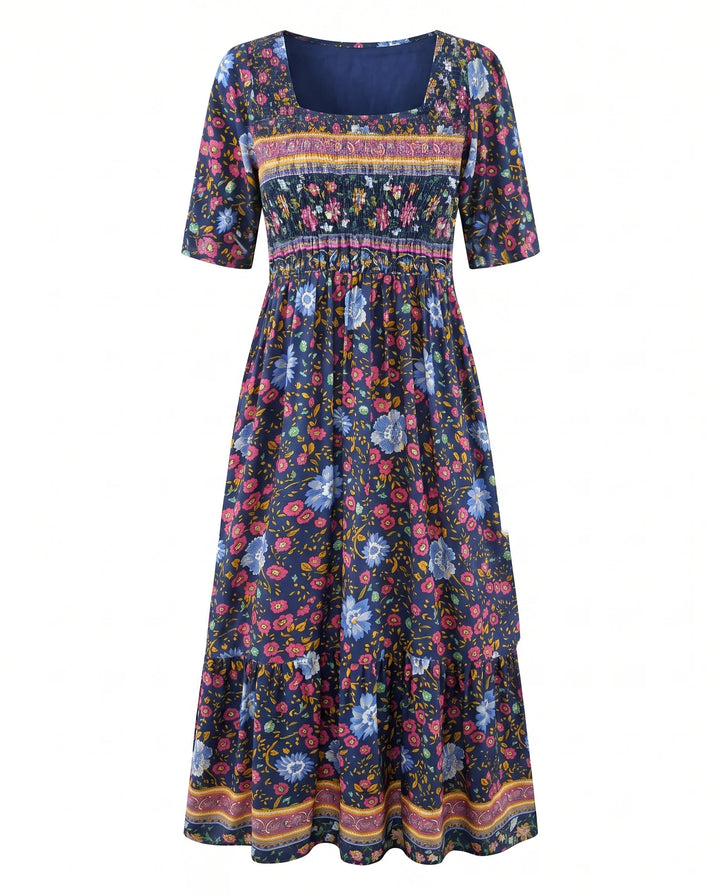 Relaxed boho dress in mid-calf length with contrasting print details