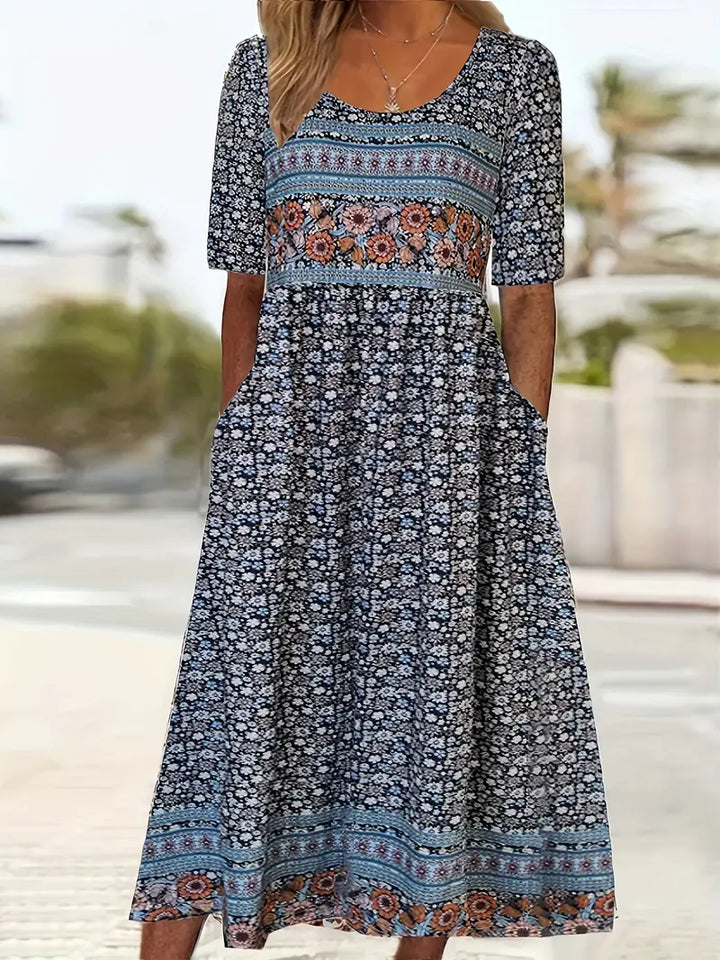 Tiered boho midi dress with shirred bodice and lightweight draping fabric