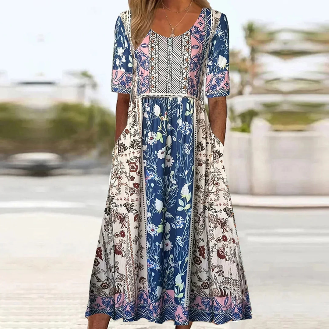 Full-length view of boho print midi dress with flowing tiered skirt