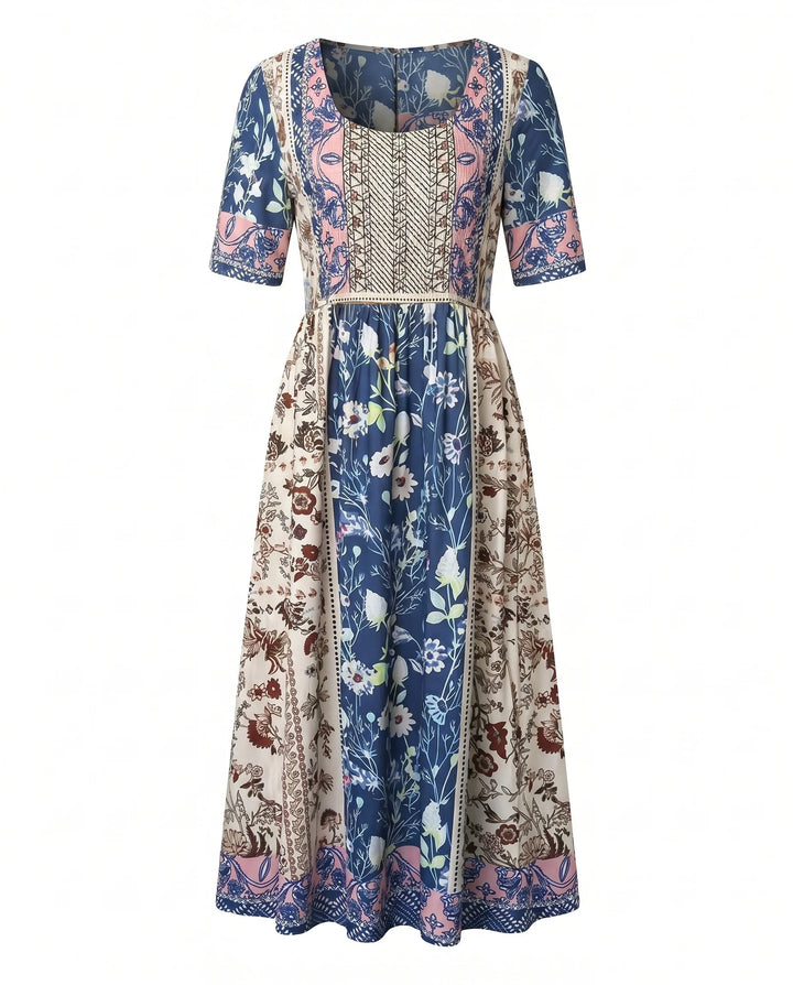 Elbow-length sleeve detail on relaxed fit boho midi dress with shirred bodice