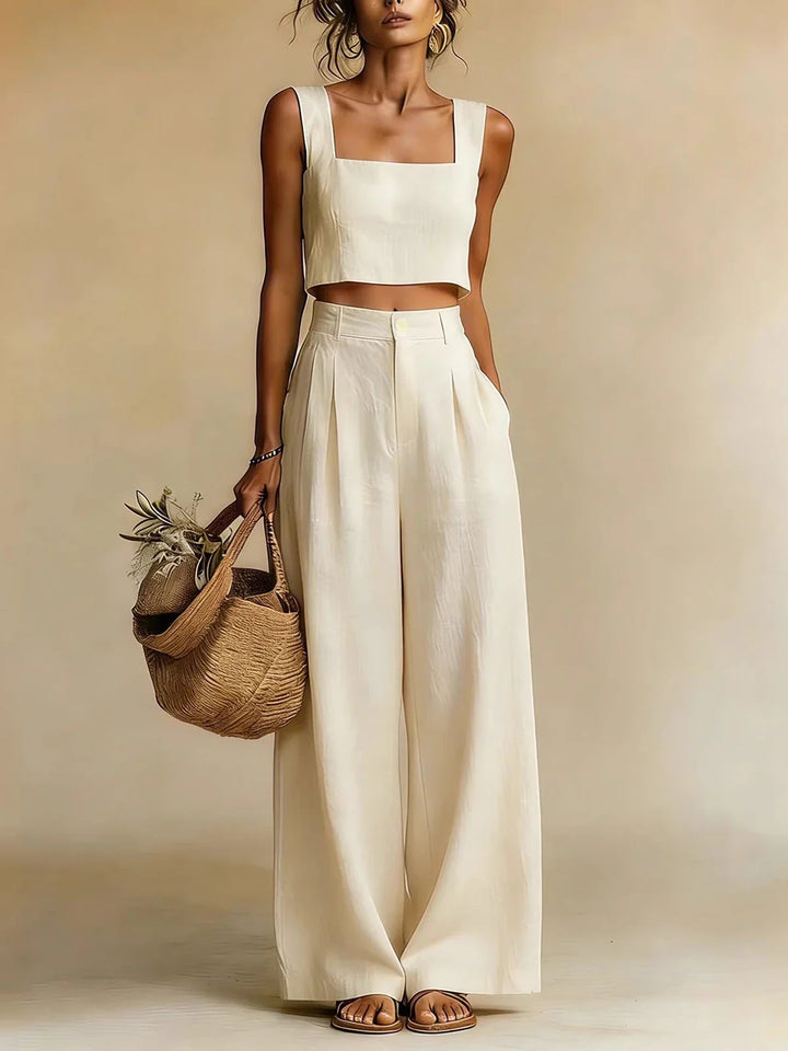 Side angle of yellow two piece Summer Pants Set with flowing wide leg silhouette and tailored waistband