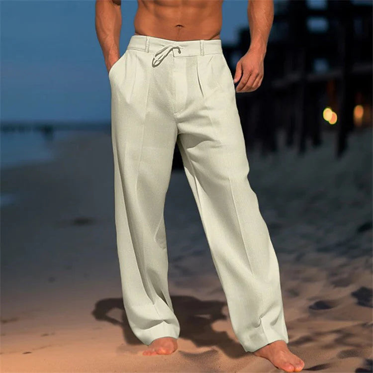 Close-up of men's casual pants showing adjustable drawstring closure and mid-rise fit