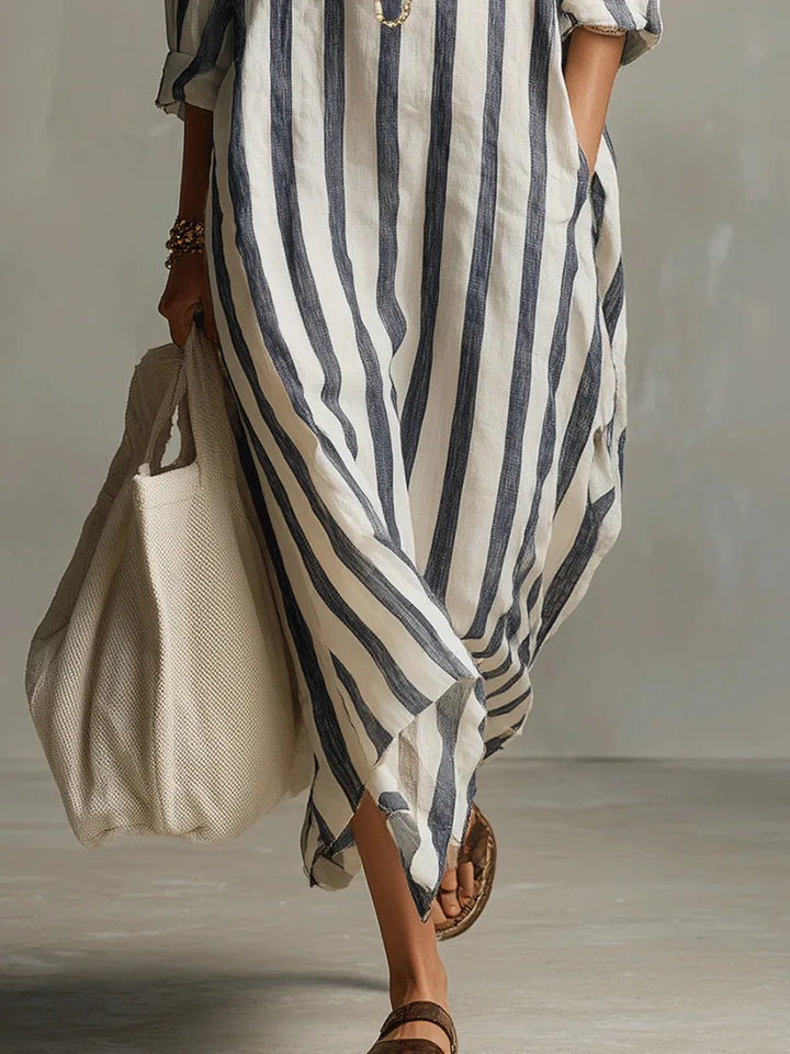 Roll-tab sleeve detail on kaftan linen long shirt dress with vertical stripe pattern