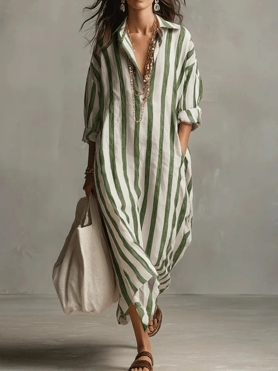 Full-length view of oversized kaftan shirt dress styled with sandals and accessories