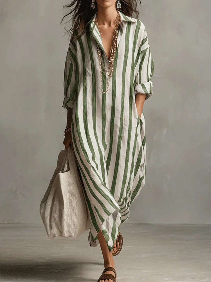 Full-length view of oversized kaftan shirt dress styled with sandals and accessories