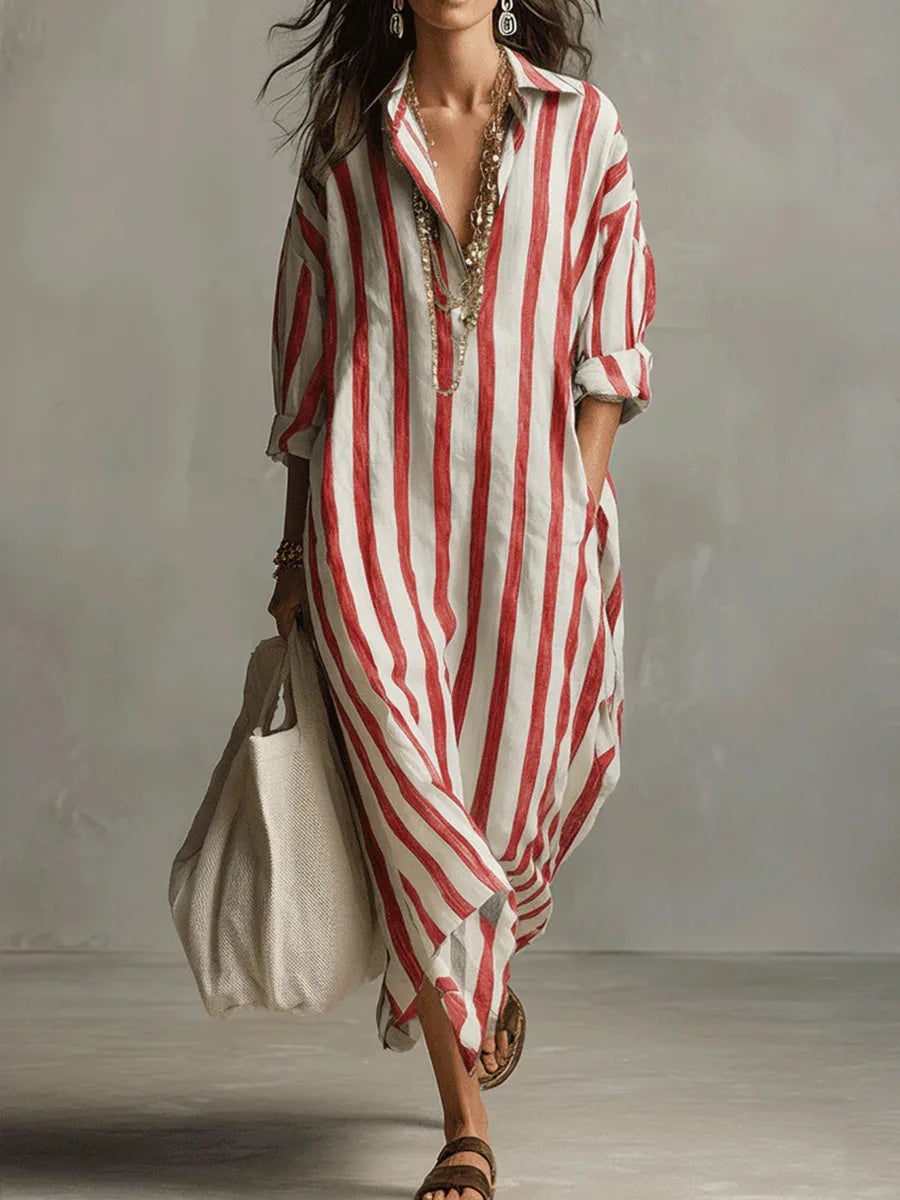 Back view of striped linen kaftan dress showing loose silhouette and flowing drape