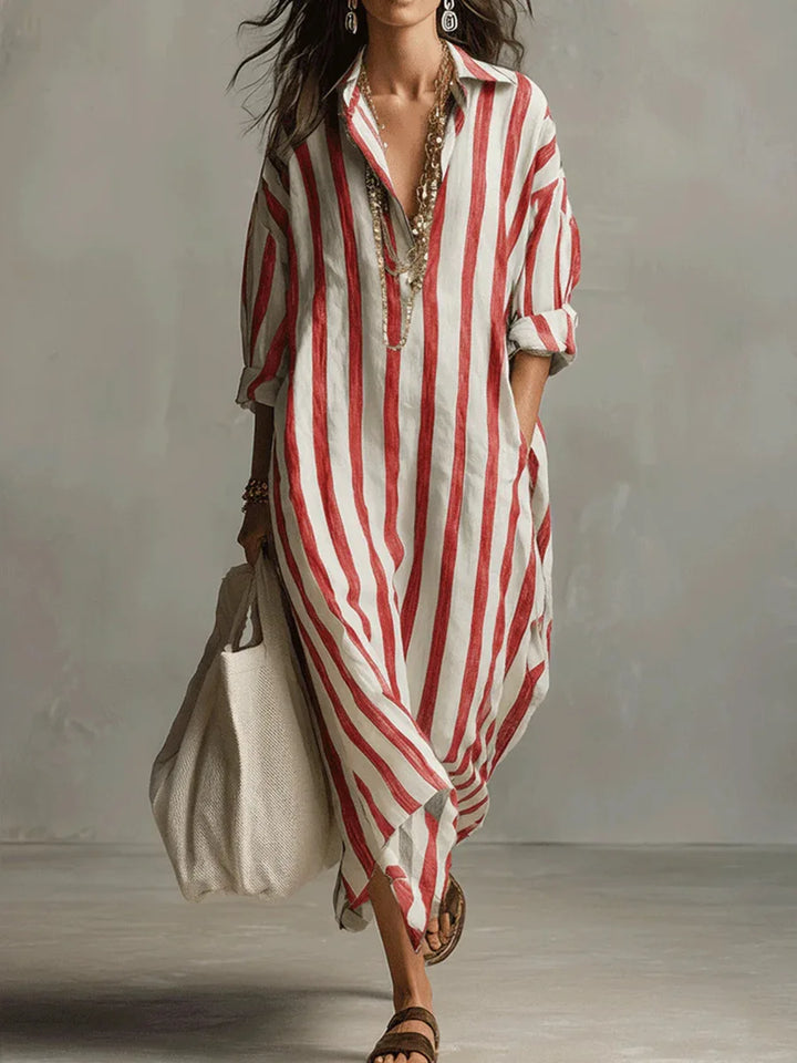 Back view of striped linen kaftan dress showing loose silhouette and flowing drape