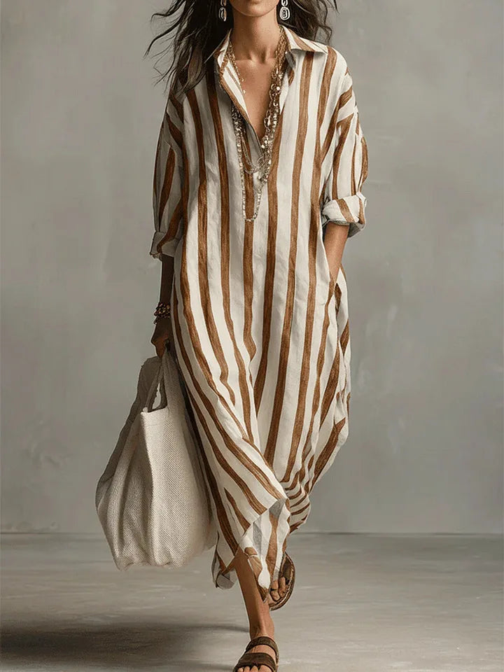 Detail of side slit and hem on ankle-length kaftan linen shirt dress