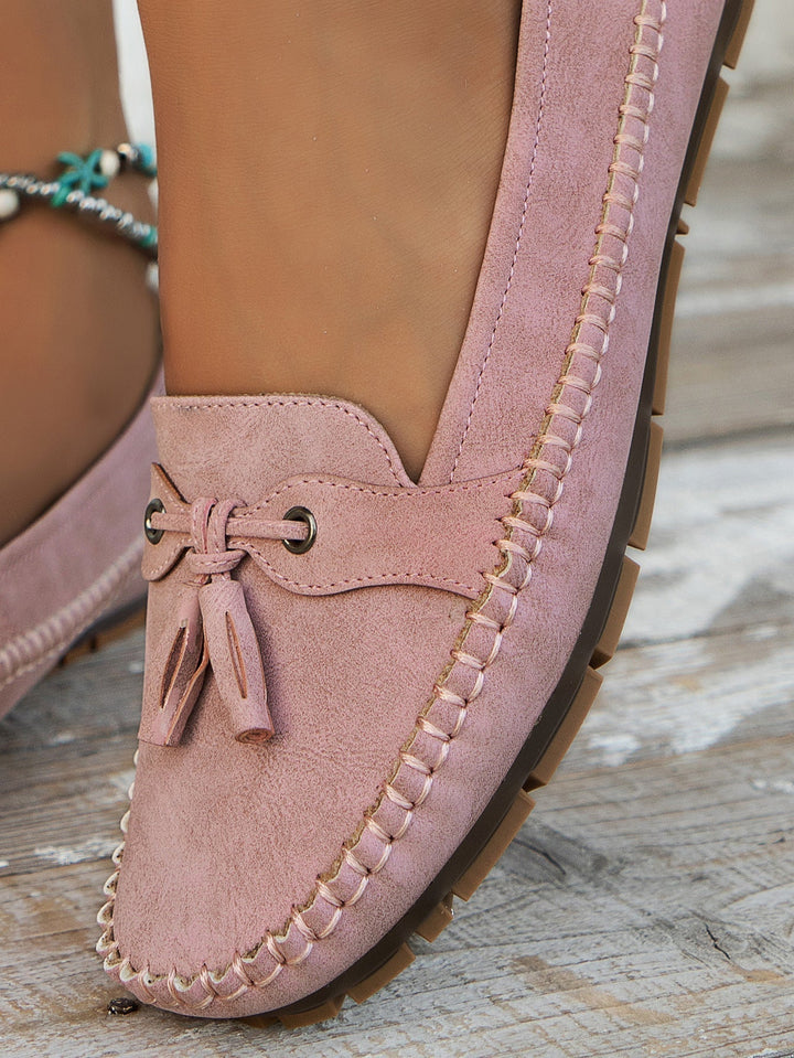 Full view of orthopedic slip-on loafers displaying classic vintage styling and ergonomic features