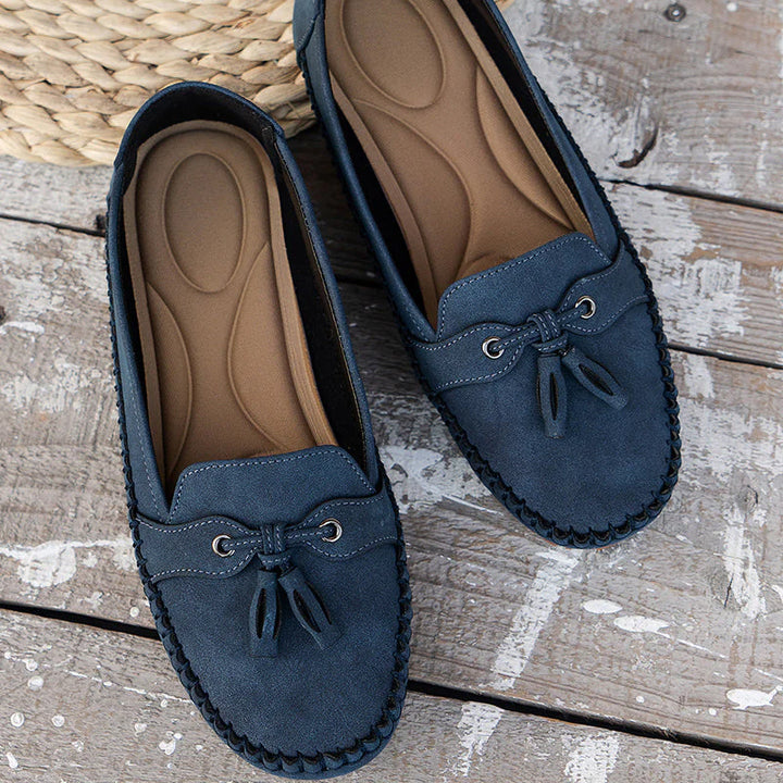 Orthopedic loafers on model showing ergonomic design and all-day wearability