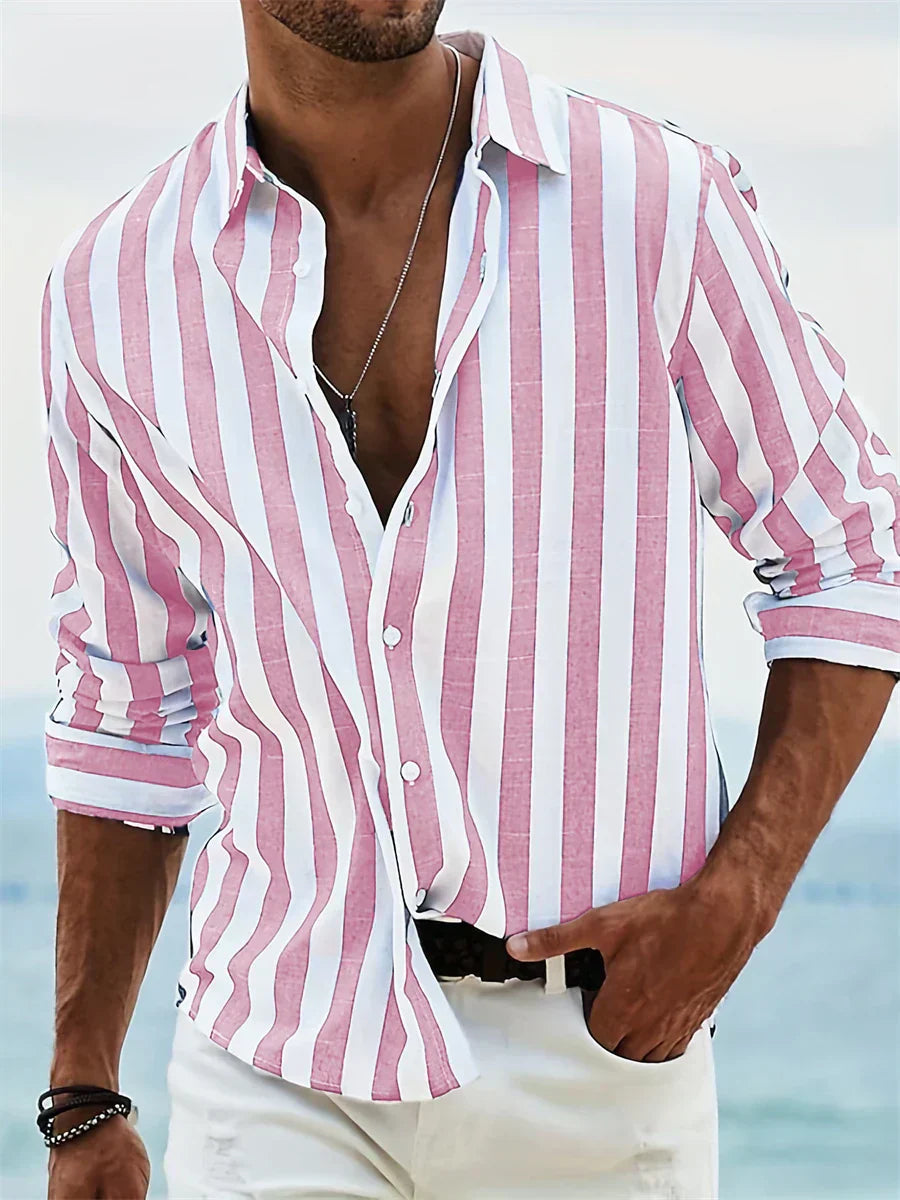 Men's striped shirt worn casually with white pants for warm-weather styling