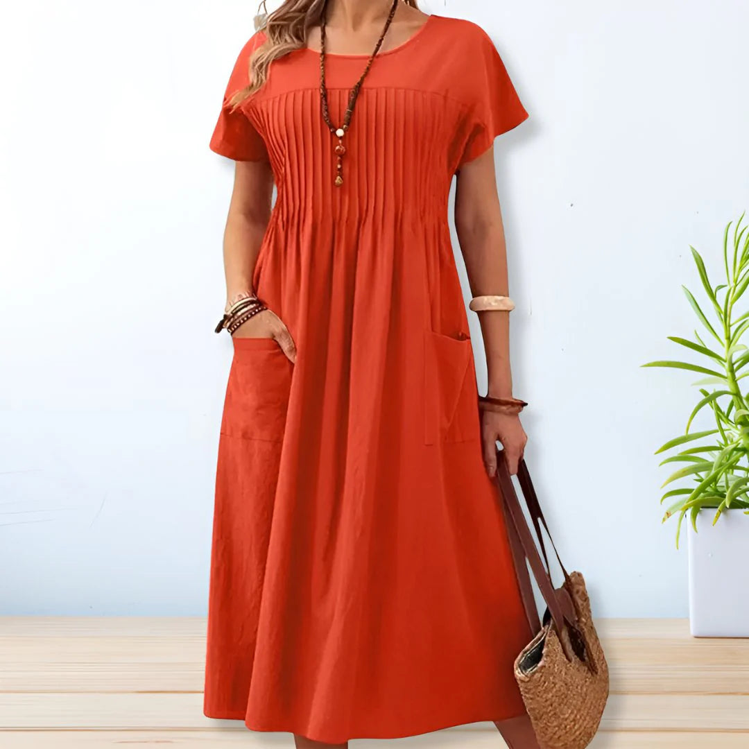 Relaxed fit cotton summer dress with side pockets and short sleeves in olive green color