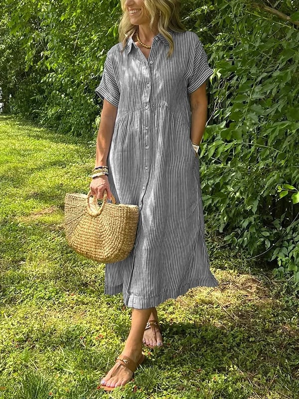Woman wearing striped midi dress with sandals for relaxed casual outdoor styling