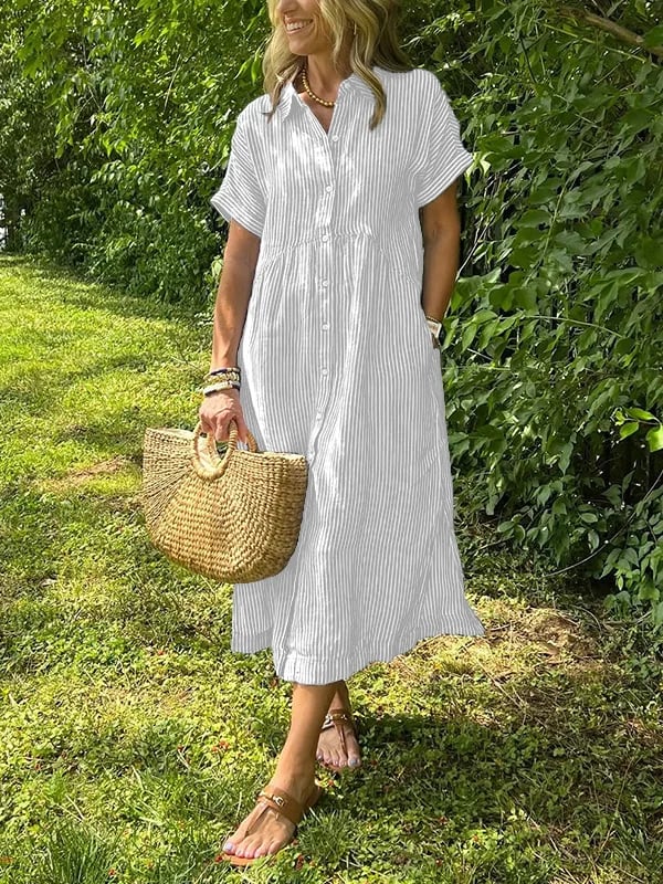 Close-up view of vertical stripe pattern and button-front closure on women's midi shirt dress