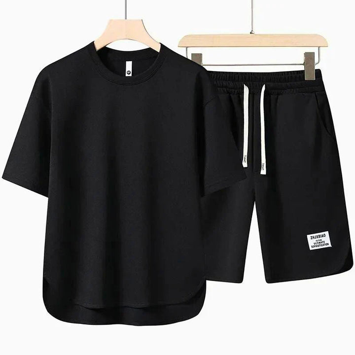 Two-piece men's casual set featuring short sleeve t-shirt and coordinating shorts