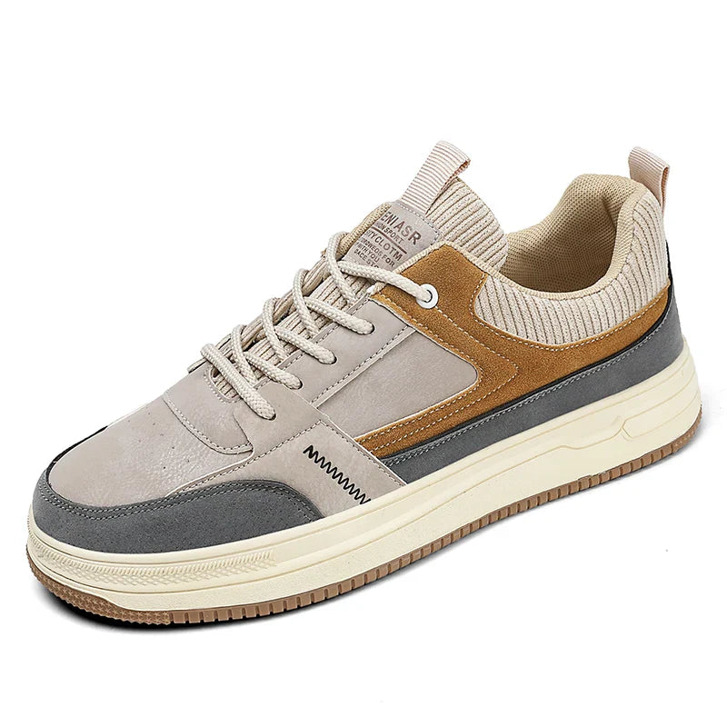 Men's low-top patchwork sneakers with retro colorblock design and ribbed knit collar on white background