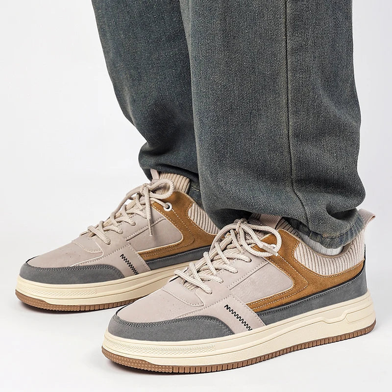 Close-up of men's low-top sneakers highlighting lace-up front and cushioned insole construction