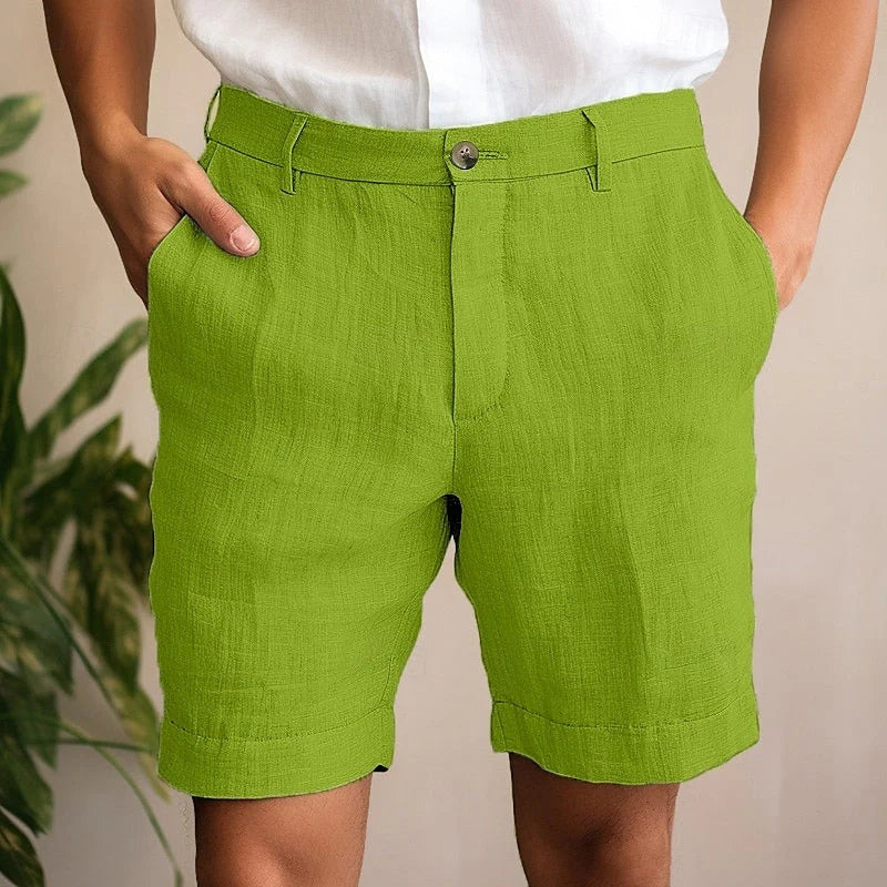 Side view of men's tailored chino shorts displaying functional pockets and mid-rise waistband detail