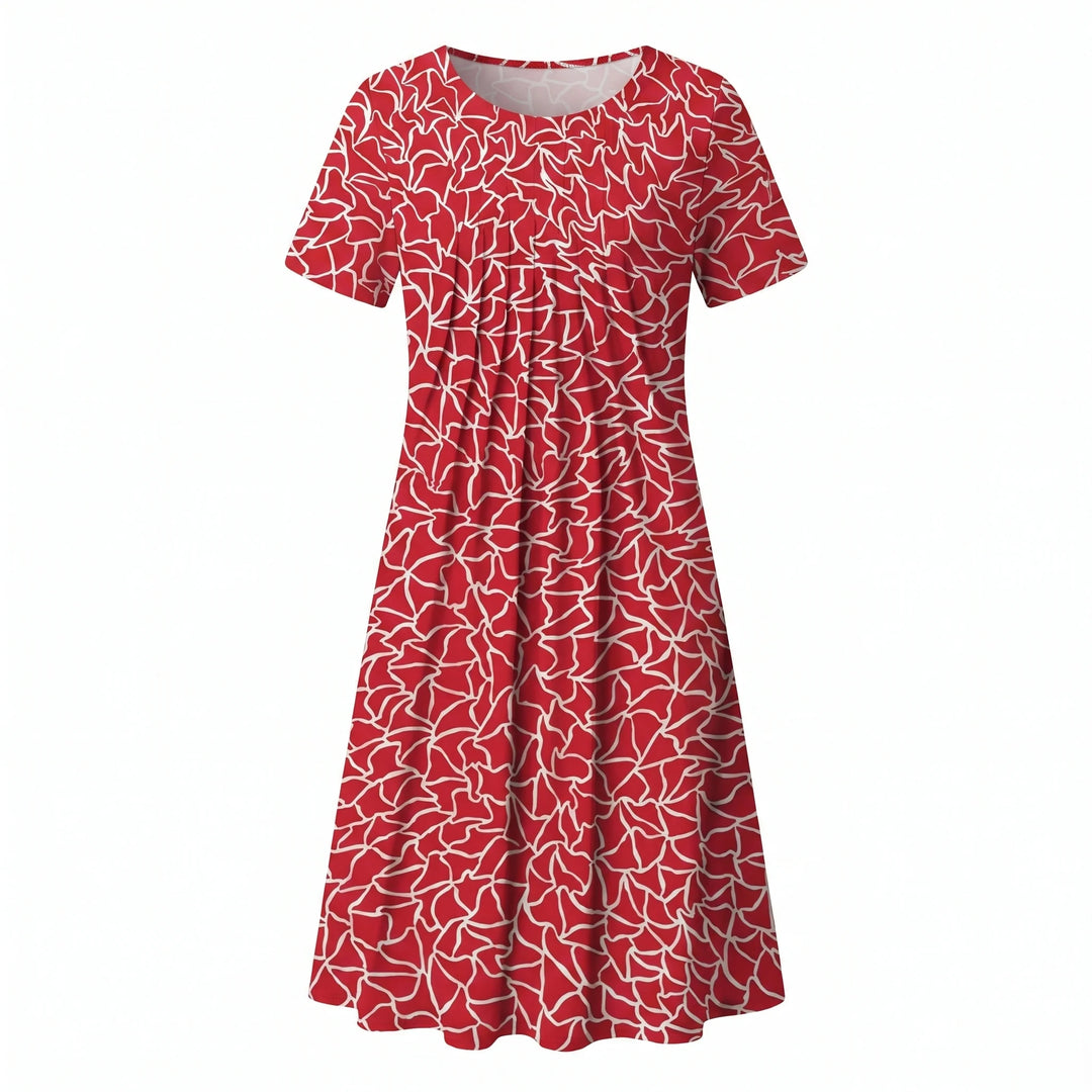 Woman wearing floral midi dress in relaxed standing pose showing fit