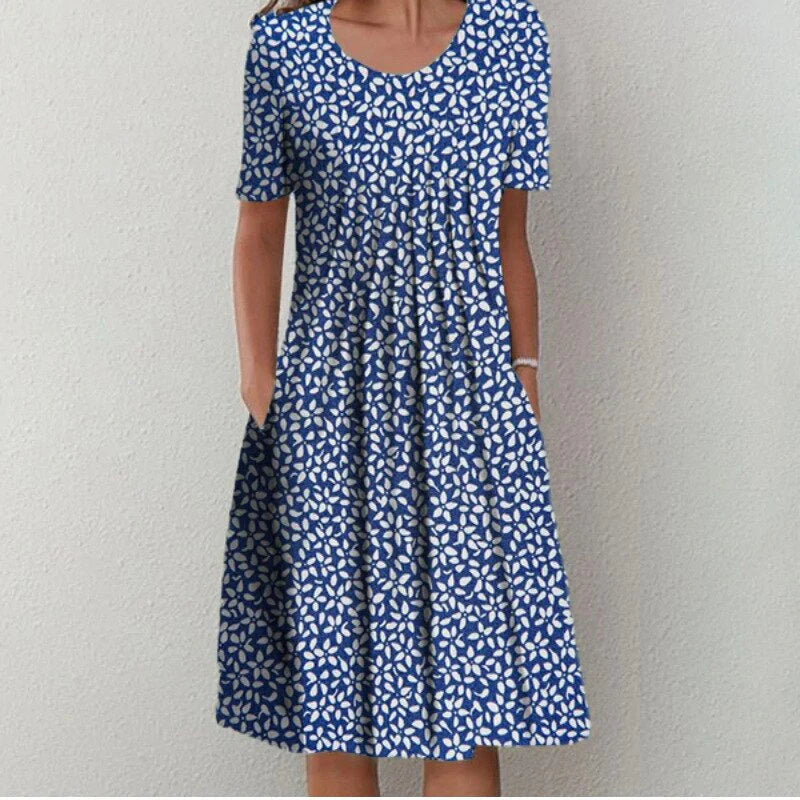 Full-body shot of floral midi dress highlighting A-line fit and length