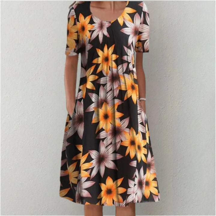 Detail view of floral midi dress neckline and upper bodice construction
