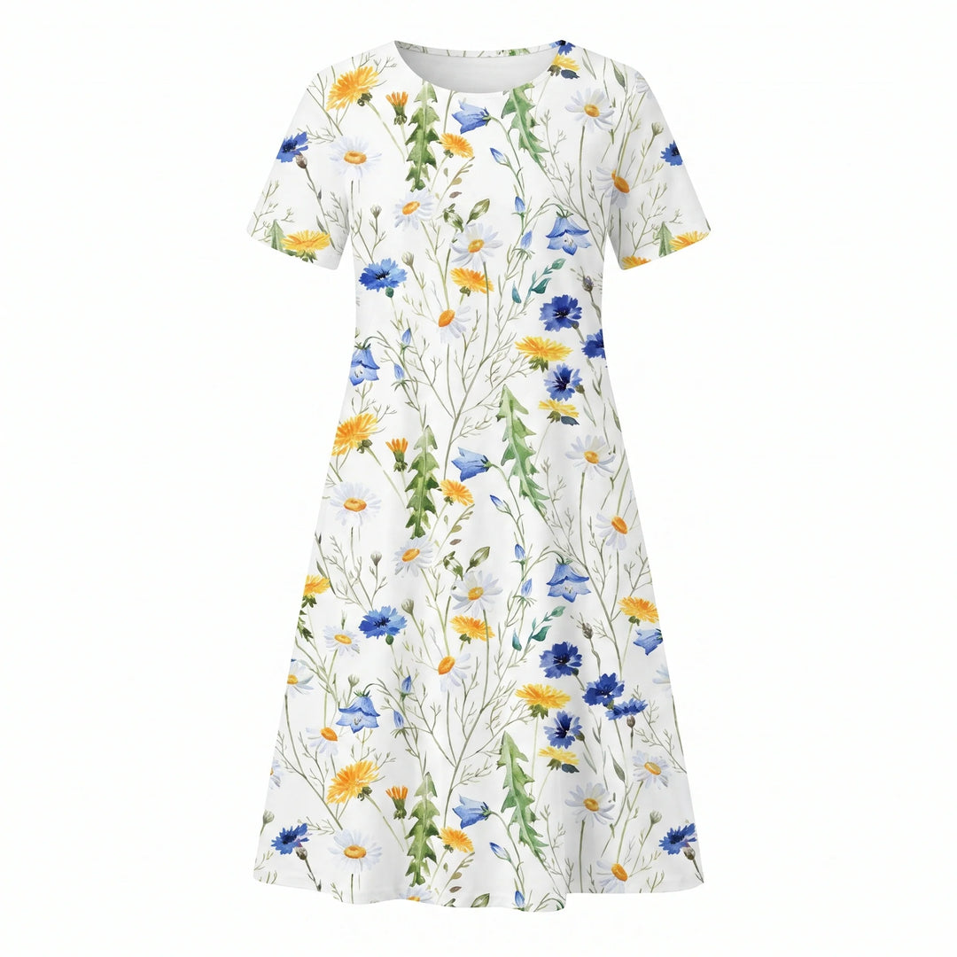 Close-up view of floral midi dress pleated bodice and round neckline detail