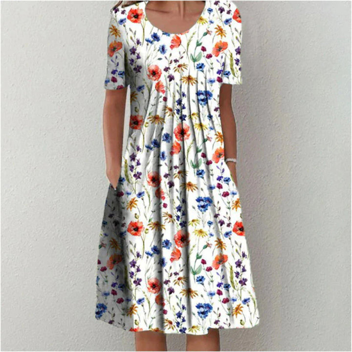 Floral midi dress shown from multiple angles demonstrating fit and drape