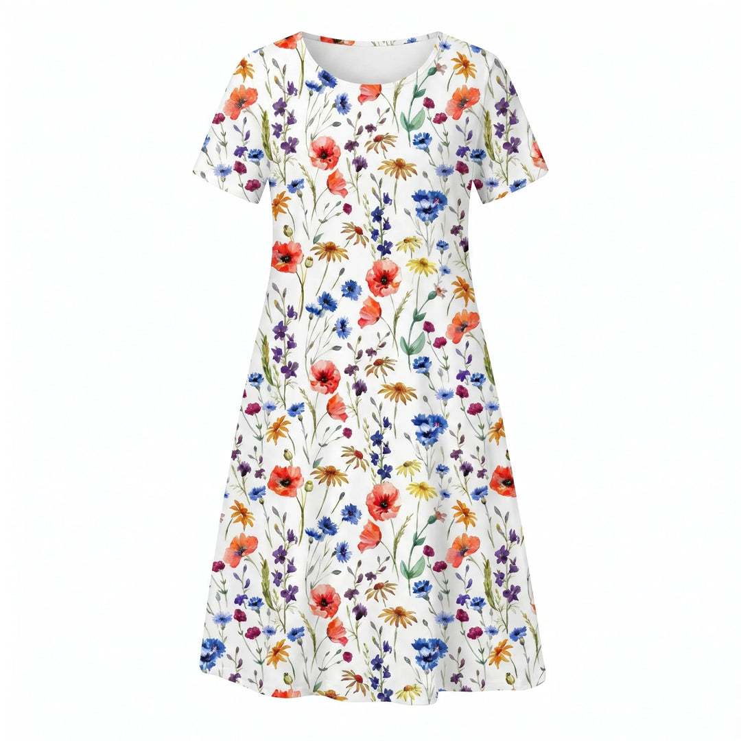 Woman styling floral midi dress with casual footwear for daytime look