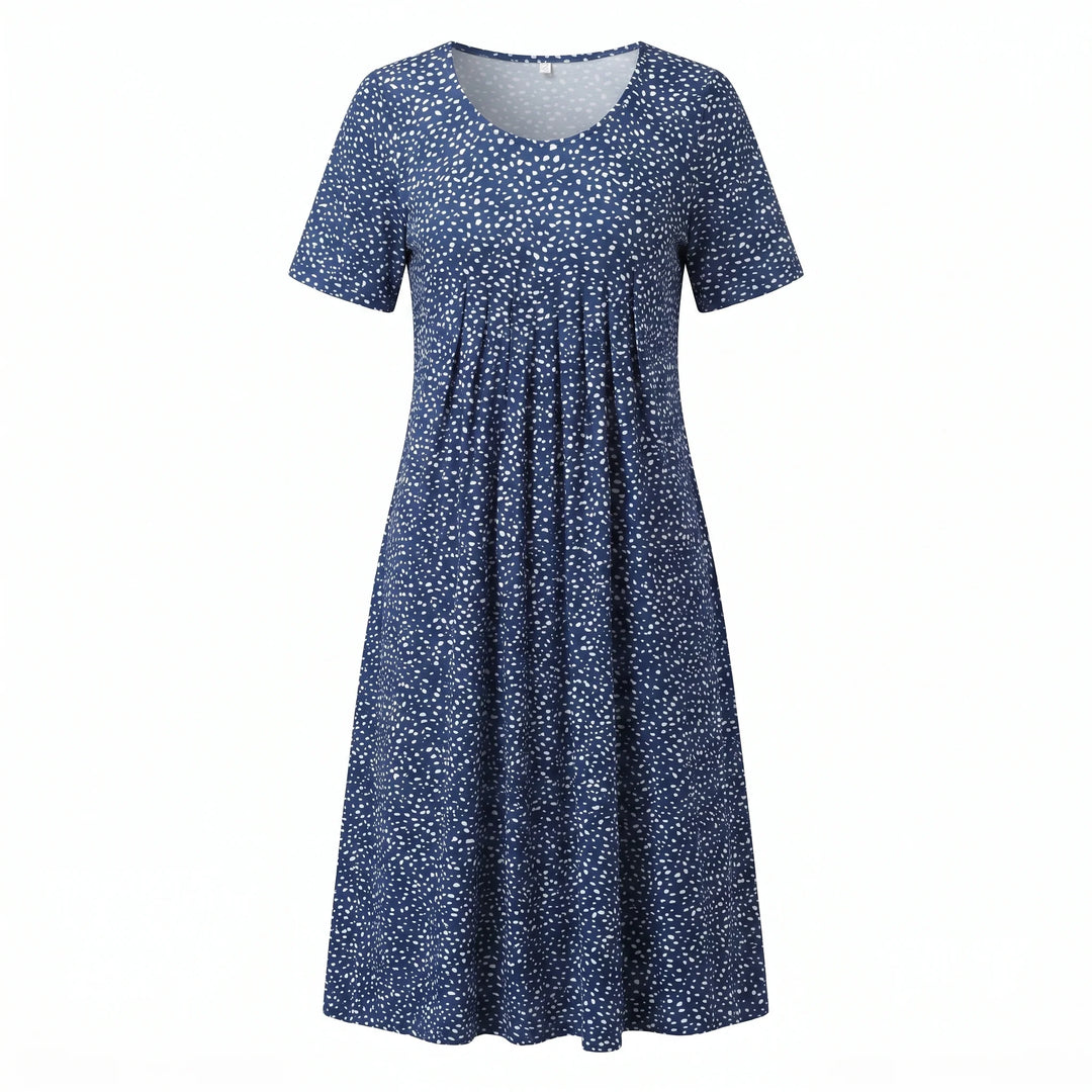 Close-up of floral midi dress fabric texture and smooth finish