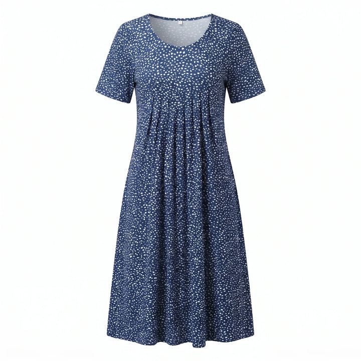 Close-up of floral midi dress fabric texture and smooth finish