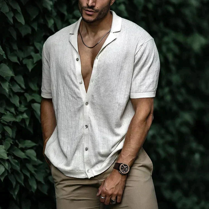 Men's textured woven shirt with open camp collar and short sleeves