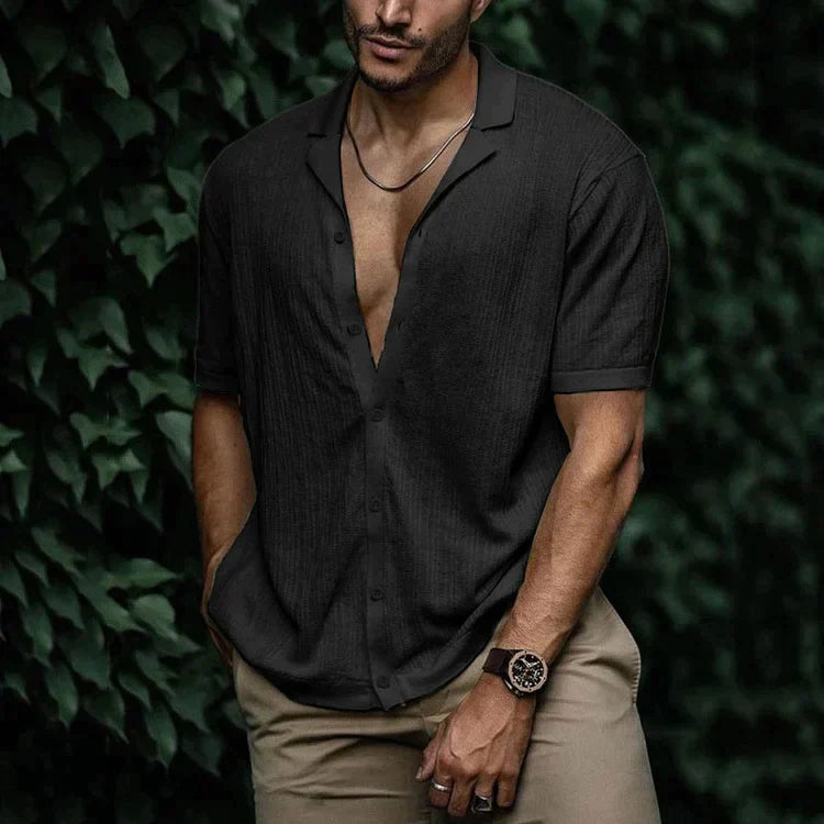 Side angle of men's short sleeve shirt with modern camp collar neckline