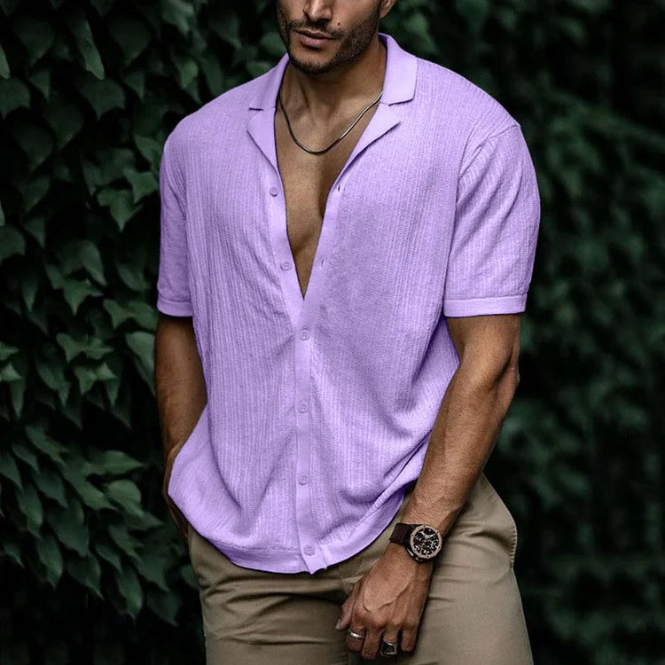 Detail shot of men's camp collar shirt featuring textured woven fabric